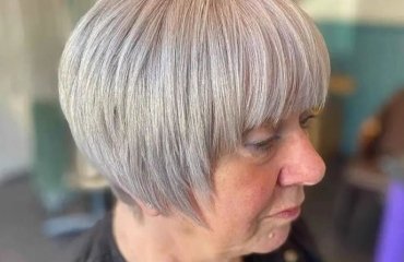 modern short bowl cut for women over 60 wear in fall 2023 hairstyle trends