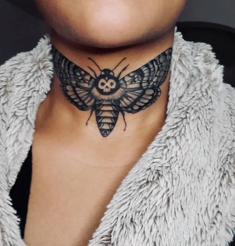 moth on throat tattoo meaning
