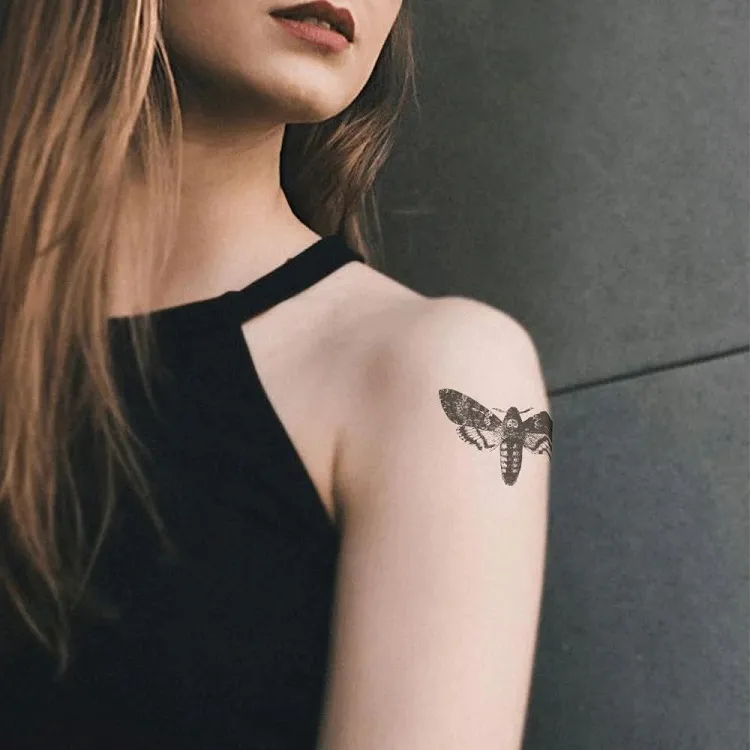 moth shoulder tattoo design 2023