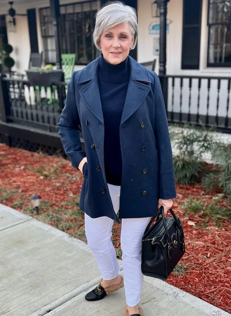 navy blue coat with white pants outfit for a 60 year old woman