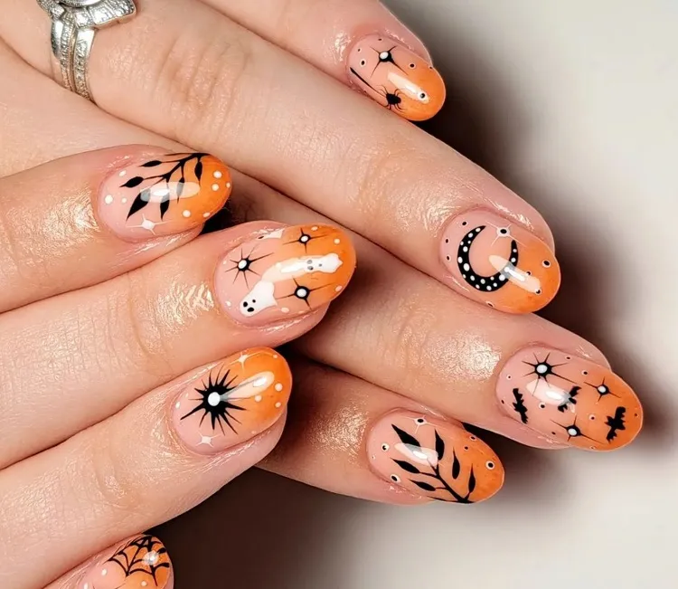orange ombre halloween nails with decoration