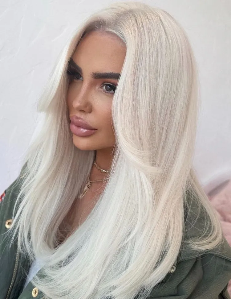 platinum blonde hairstyle with curtain bangs