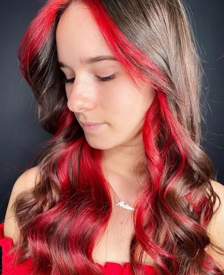 red peekaboo highlights on brown hair