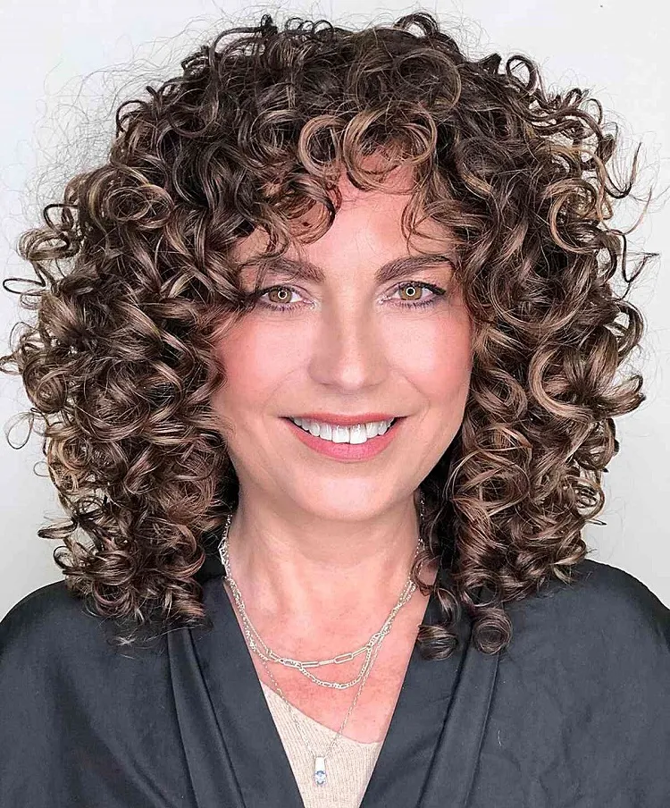 rejuvenating soft curls for women aged 50 with mid length hair