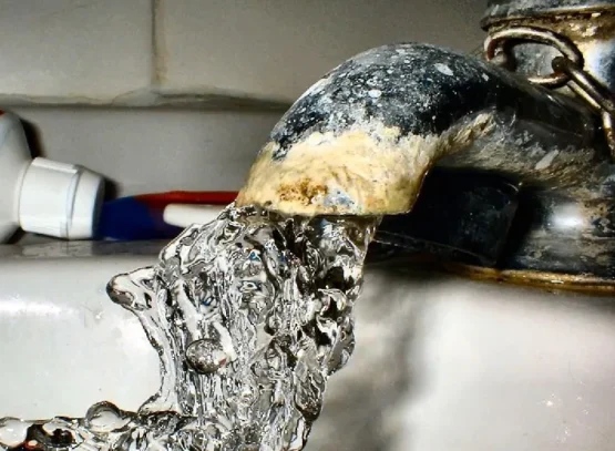 remove limescale from taps scrub off the buildup