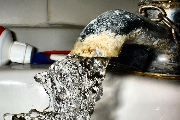 remove limescale from taps scrub off the buildup