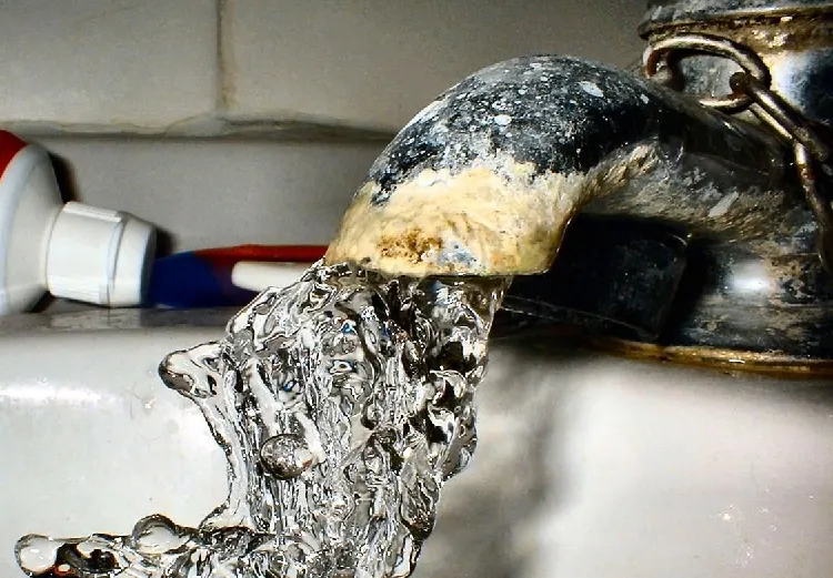 remove limescale from taps scrub off the buildup