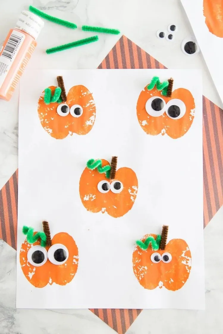 simple apple stamp pumpkin halloween craft for toddlers