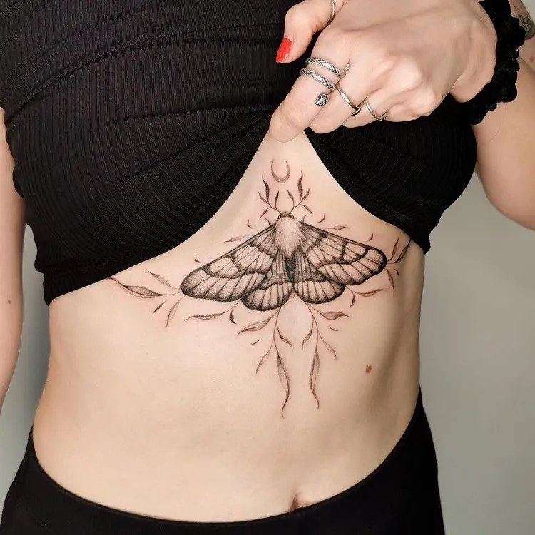 sternum moth tattoo
