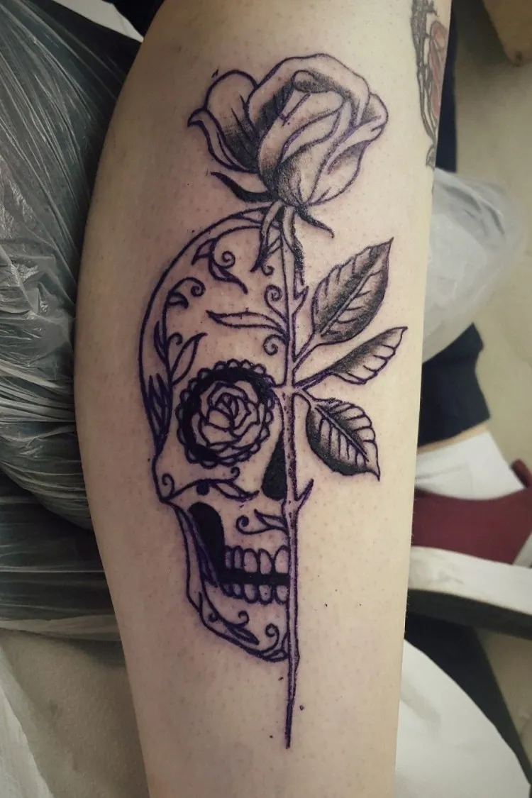 sugar skull tattoo with rose