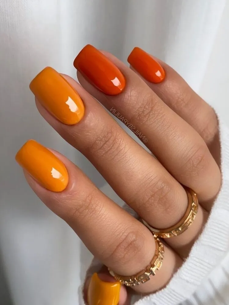 vibrant orange fall nail art