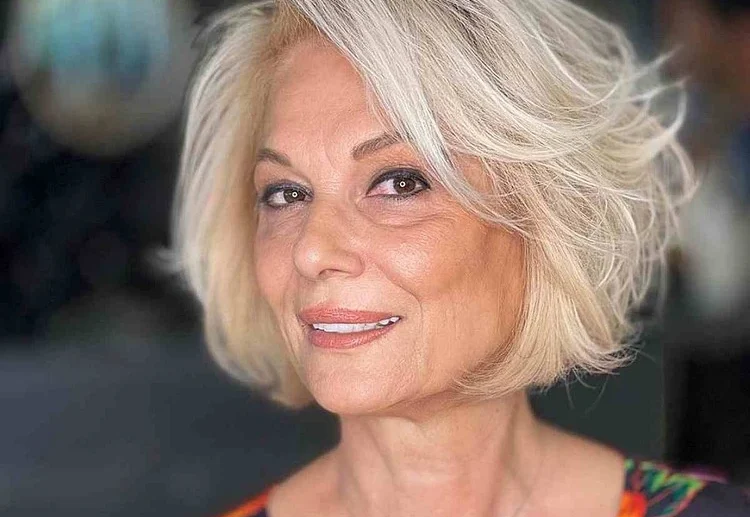 voluminous bob side swept bangs trendy short hairstyle women over 60