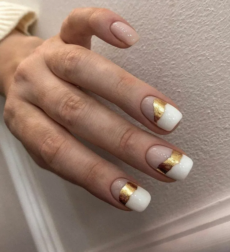 white tips gold foil stylish abstract fall nail design 2023