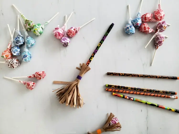 witches broom craft as gifts with lollipops and pencils