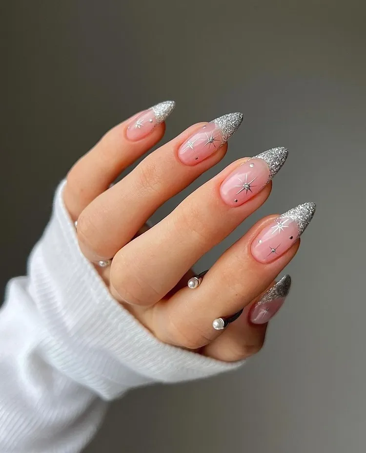 french manicure winter 2023 2024 silver nails with stars decorations