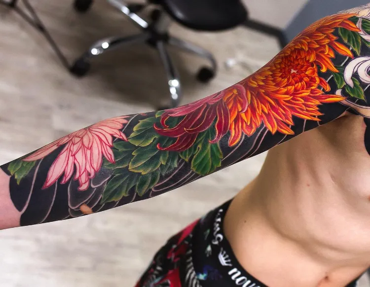 japanese chrysanthemum tattoo in color whole arm design for men