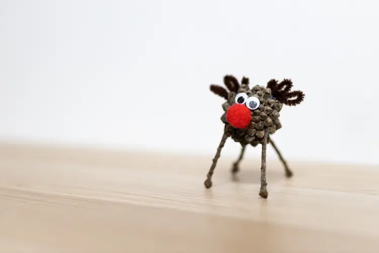 pine cone christmas crafts with kids how to make a reindeer