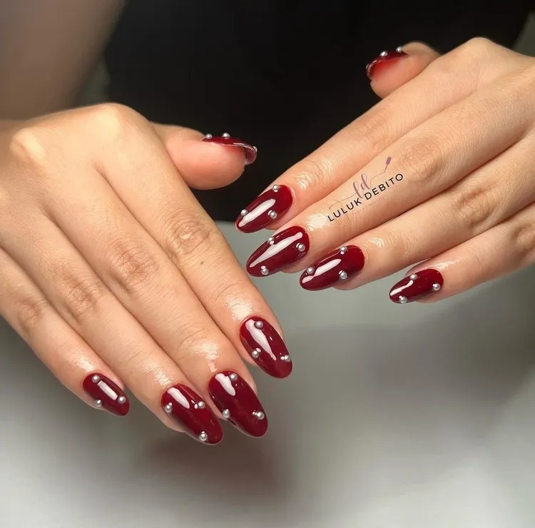 almond nails burgundy red manicure with pearls