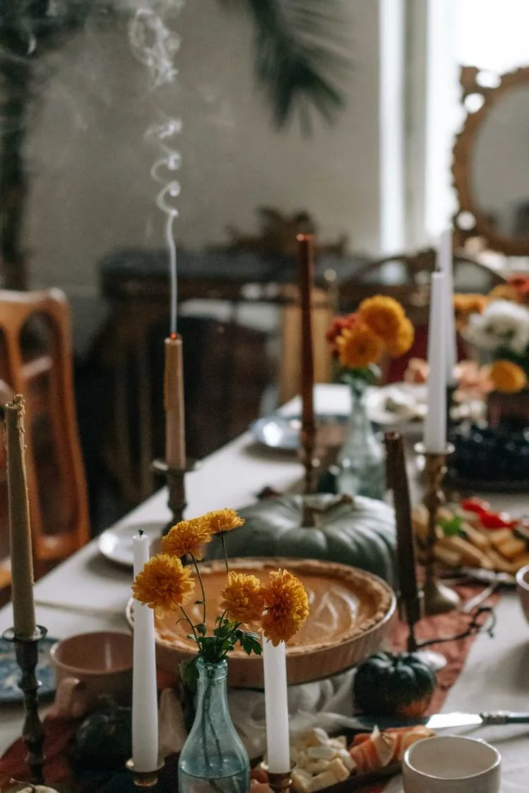 beautiful thanksgiving table setting with pumpkin centerpiece