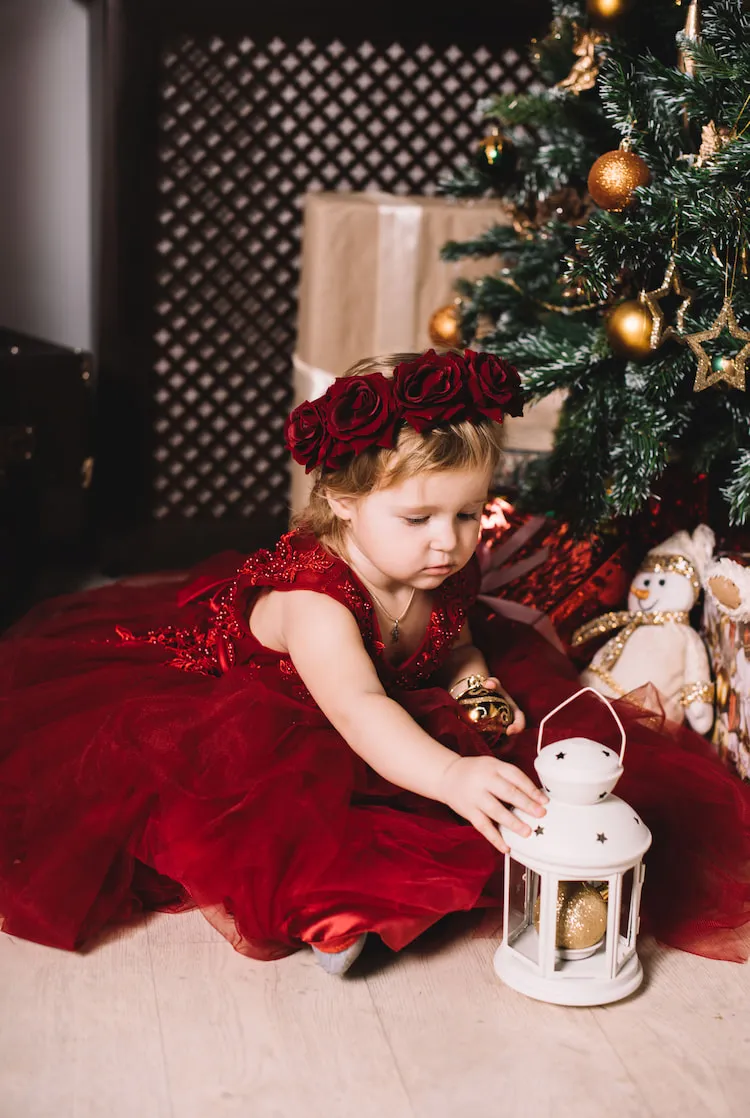 beautiful red dress floral crown festive outfit for girls christmas toddler photoshoot ideas 2023
