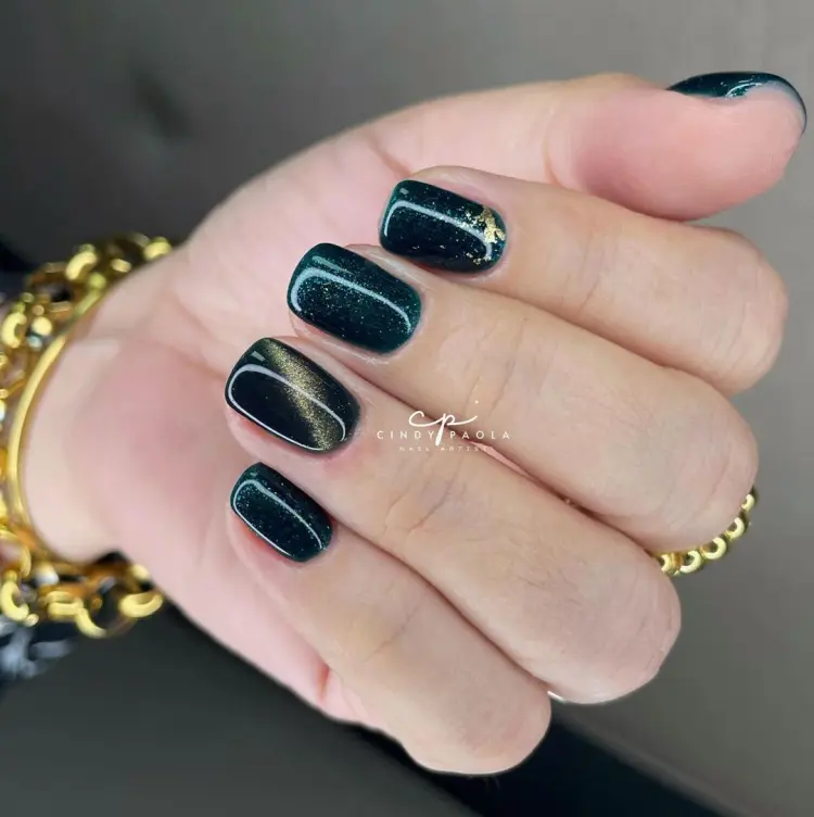 black and gold manicure new years eve nails 2024