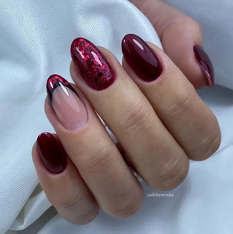 burgundy red manicure with glitter