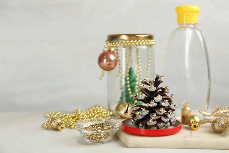 decorated pinecones in a jar diy christmas decoration
