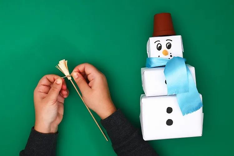 diy snowman craft with small gift boxes satin ribbon