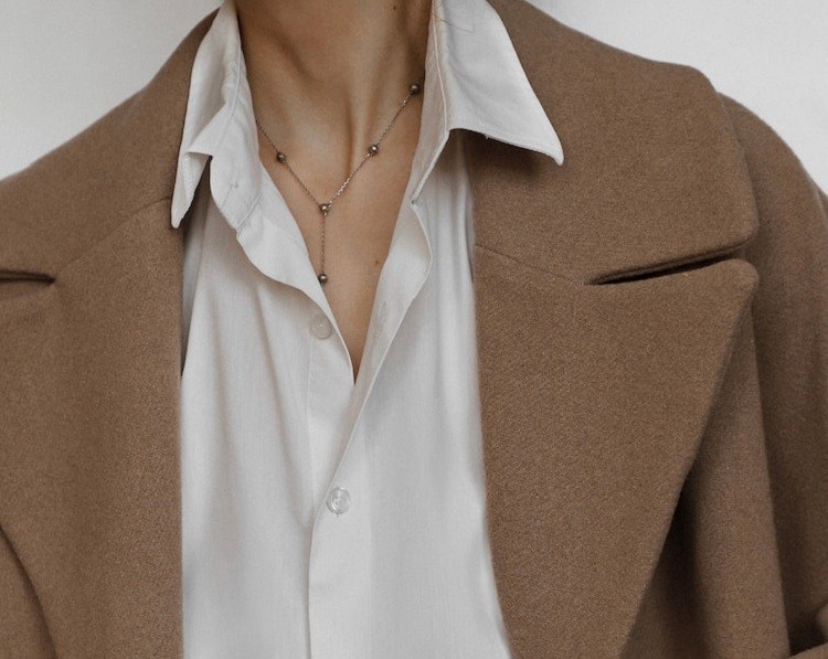 half tucked white shirt brown coat high waisted leather pants styling inspo winter 2023 2024