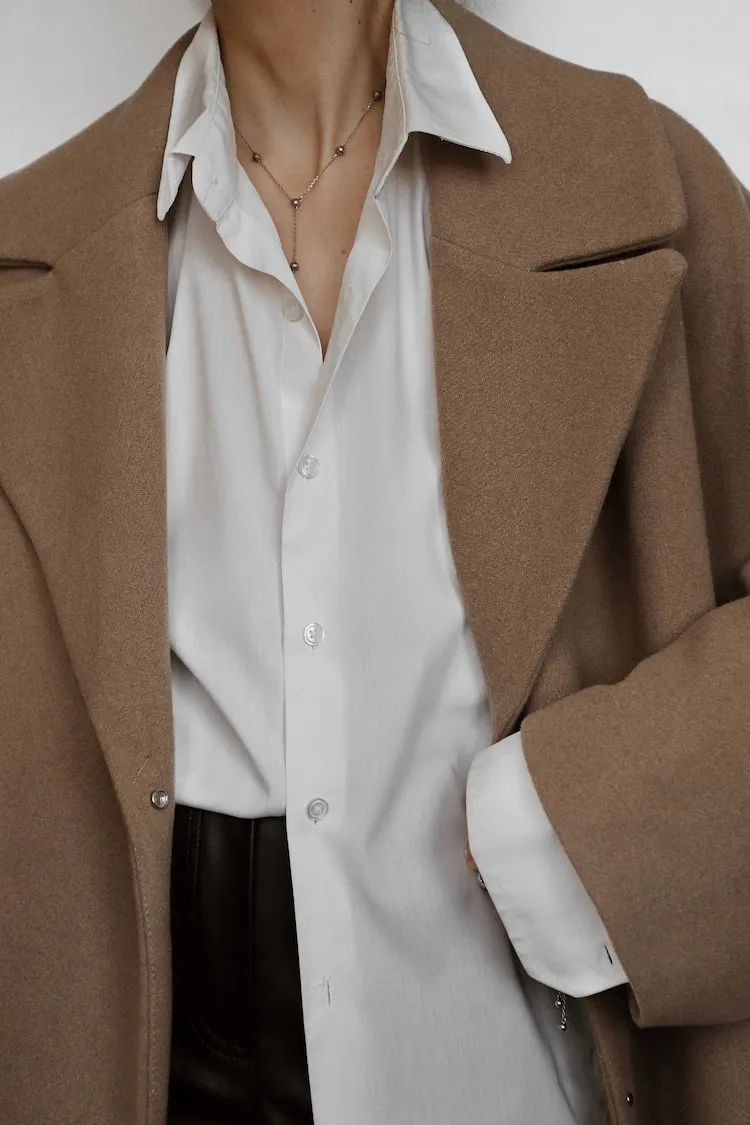half tucked white shirt brown coat leather pants styling inspo winter 2023 2024