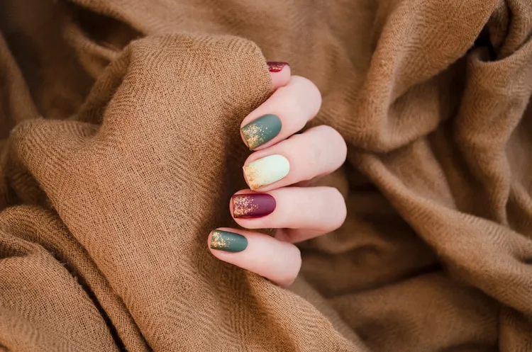 matte moody green burgundy beige nails gold glitter french tip ombre