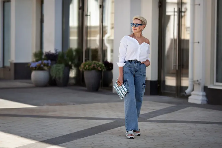 off the shoulder white button down shirt styling idea woman over 50