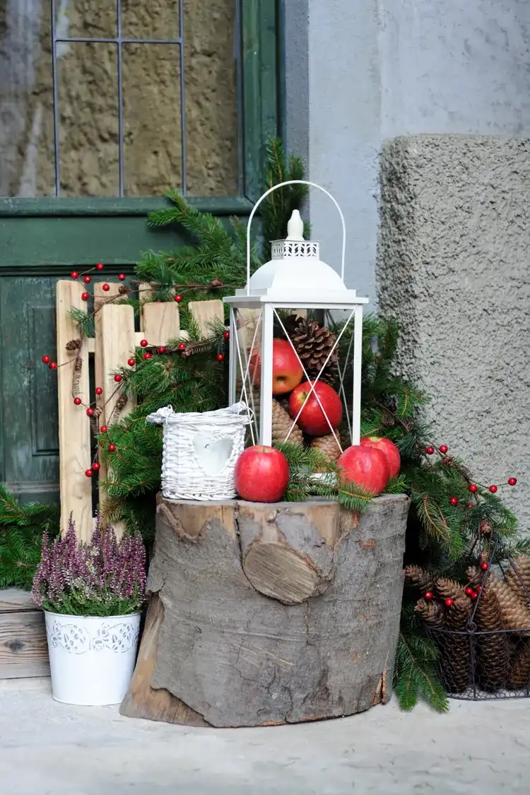 outdoor advent decoration with natural materials and lantern