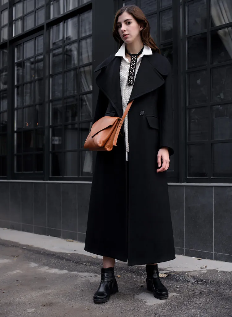 oversized black wool coat white shirt knit sweater casual winter outfit