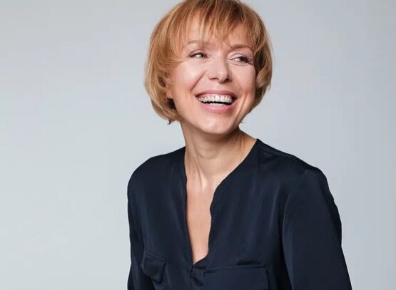 short layered bob choppy bangs rejuvenating haircut woman over 60
