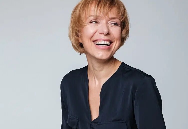 short layered bob choppy bangs rejuvenating haircut woman over 60