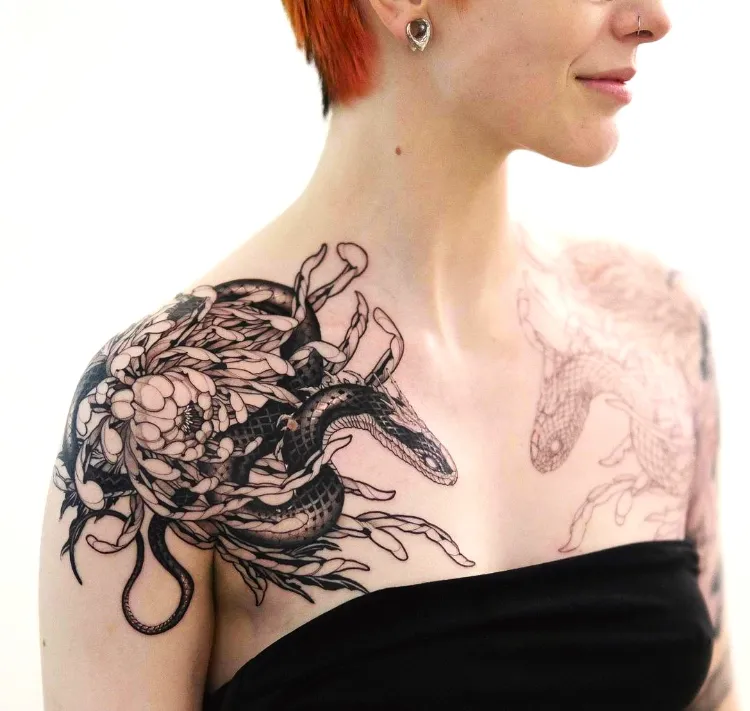 tattoo idea chrysanthemum and snake on shoulder for women meaning