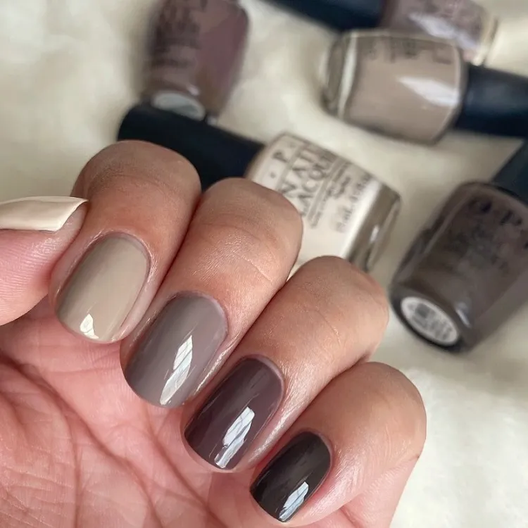 trendy nails mismatched manicure fall winter 2023 nail polish taupe gray brown beige