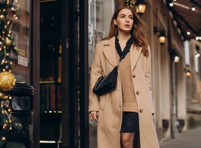 wearing short skirt in the winter styling ideas knitted sweater long trench coat platform combat boots fall winter fashion 2023