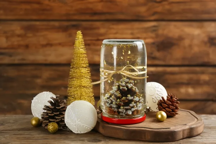 use glass jars to create a festive christmas atmosphere diy snow globe