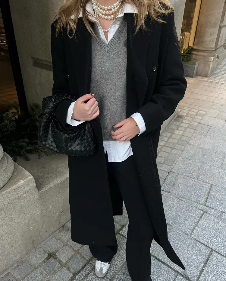 business casual winter rich mom outfit v neck sweater white shirt long black coat adidas samba