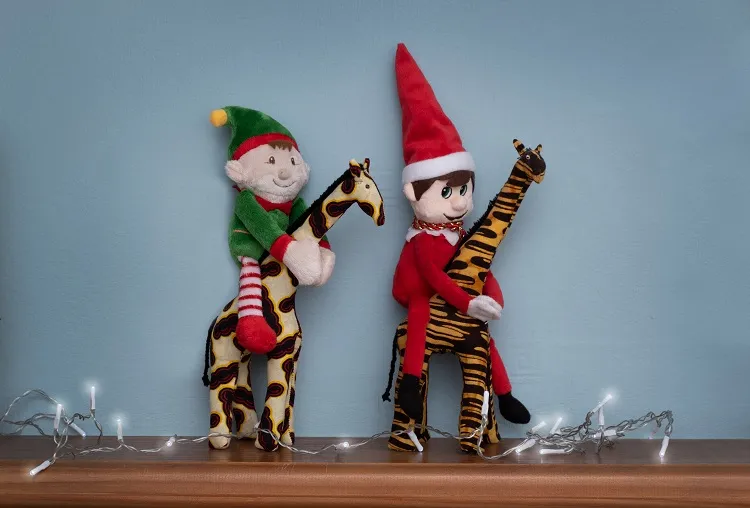 elves riding stuffed giraffes funny