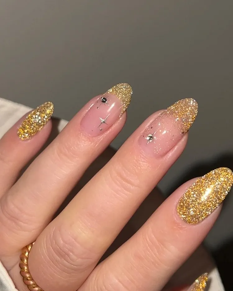 gold glitter celestial nails design