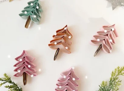 making colorful christmas trees with toilet paper rolls