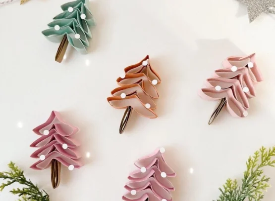 making colorful christmas trees with toilet paper rolls
