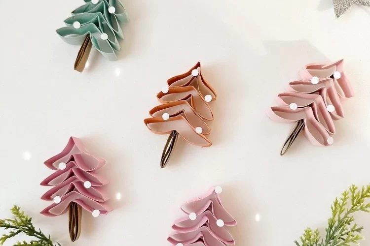 making colorful christmas trees with toilet paper rolls