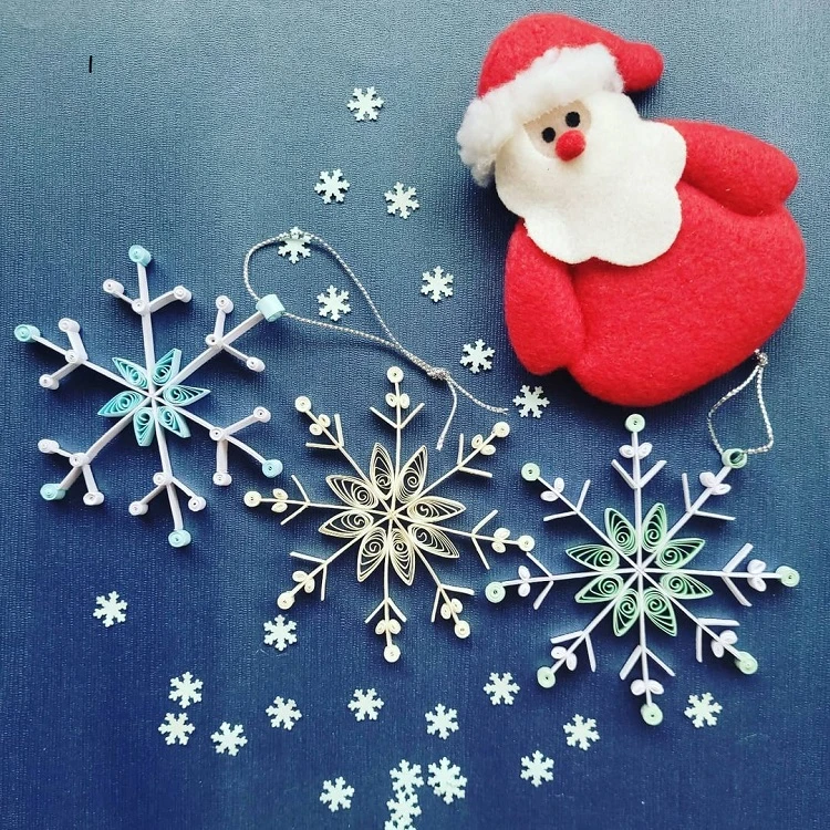 paper quill snowflakes gift toppers with video tutorial