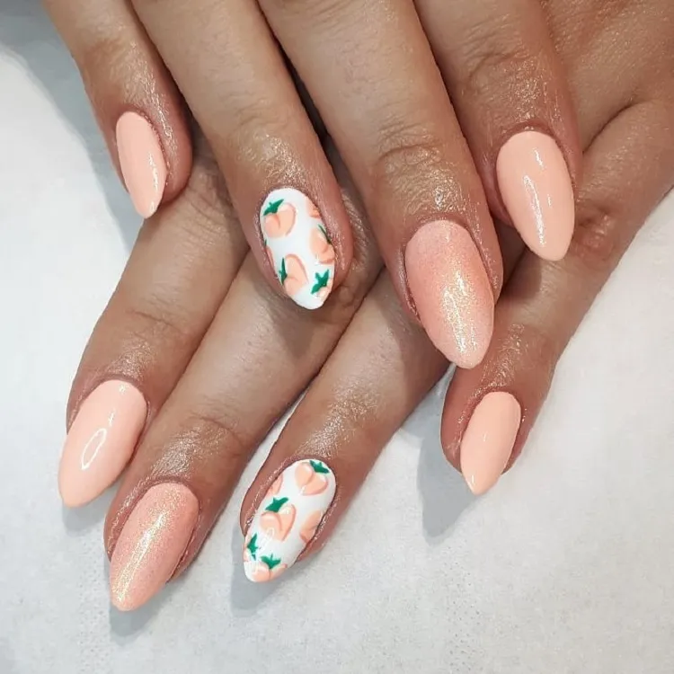 peach fuzz nails with peach nail art