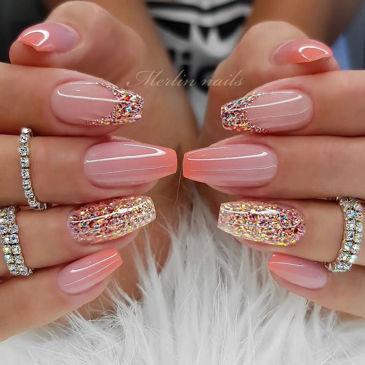 beautiful and feminine ombre and glitter nail design