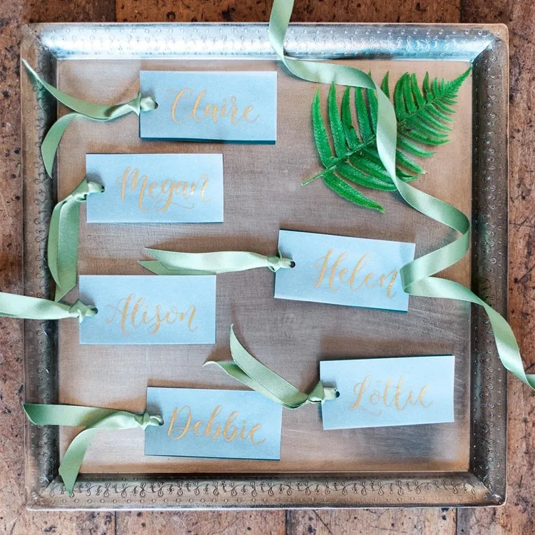 diy place cards blue and gold wedding table decor ideas on a budget
